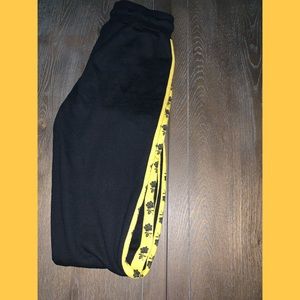 Black and yellow sweatpants